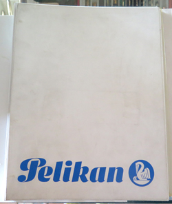 #6322: PELIKAN BINDER, WHITE WITH BLUE PELIKAN EMBLEM. Include letter from "Pelikan AG" inside.